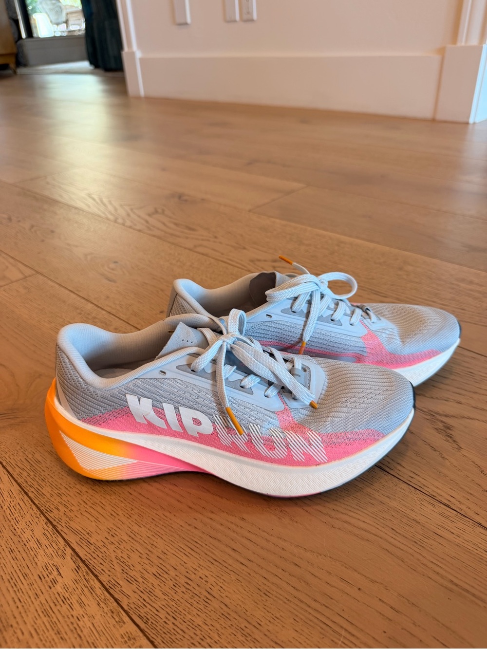Women's Athletic Running Shoes in Light Gray with Pink & Orange Accents